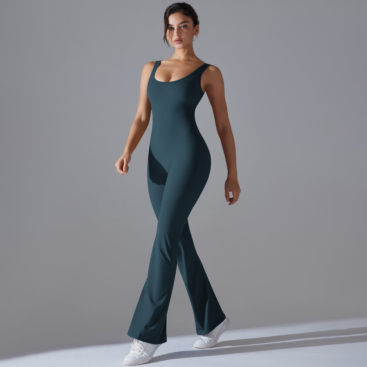 Beautiful Hollow Back Bodysuit for Women Peach Cutting High Waisted Sports Jumpsuit with Flared Pants and Butt Lifting Design for Yoga Gym and Activewear