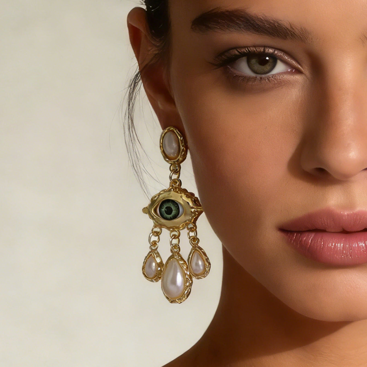 Stunning Vintage Devil's Eye Earrings with Rhinestone and Faux Pearl Accents - Exquisite Court-Style Tassel Design for Elegant Fashion