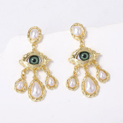 Stunning Vintage Devil's Eye Earrings with Rhinestone and Faux Pearl Accents - Exquisite Court-Style Tassel Design for Elegant Fashion