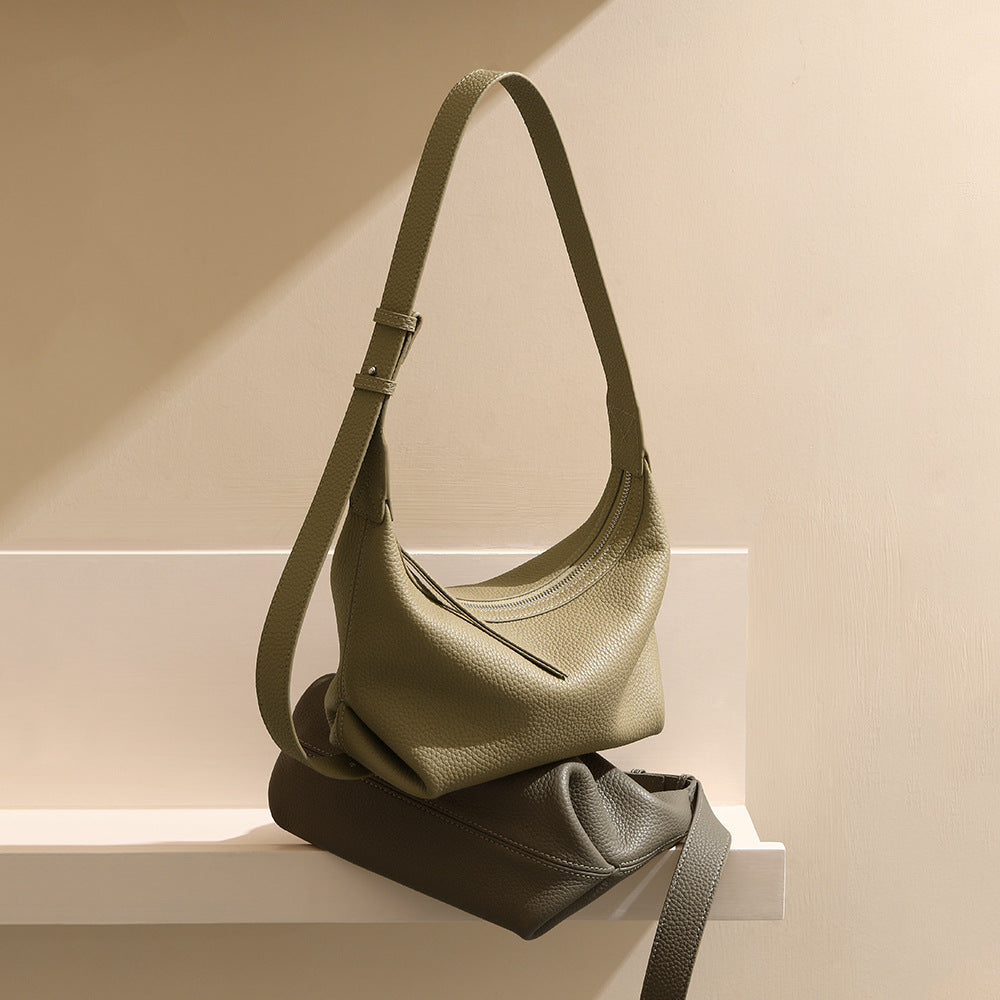 Genuine First Layer Cowhide Dumpling Bag Versatile and Unique Shoulder and Crossbody Design for a Luxe Feel