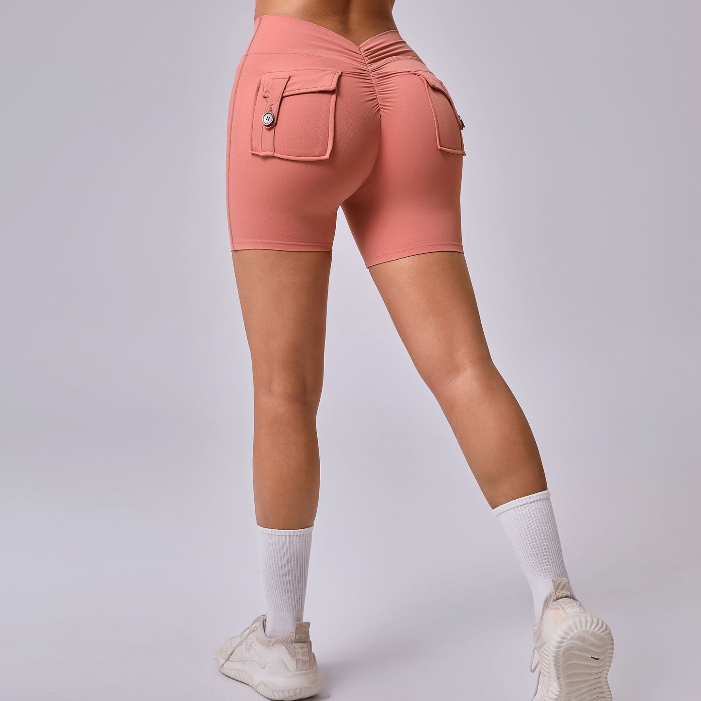 High Waisted Ruched Butt Lifting Yoga Shorts with Pockets Ultra Comfortable Peach Butt Gym Shorts for Enhanced Performance and Style