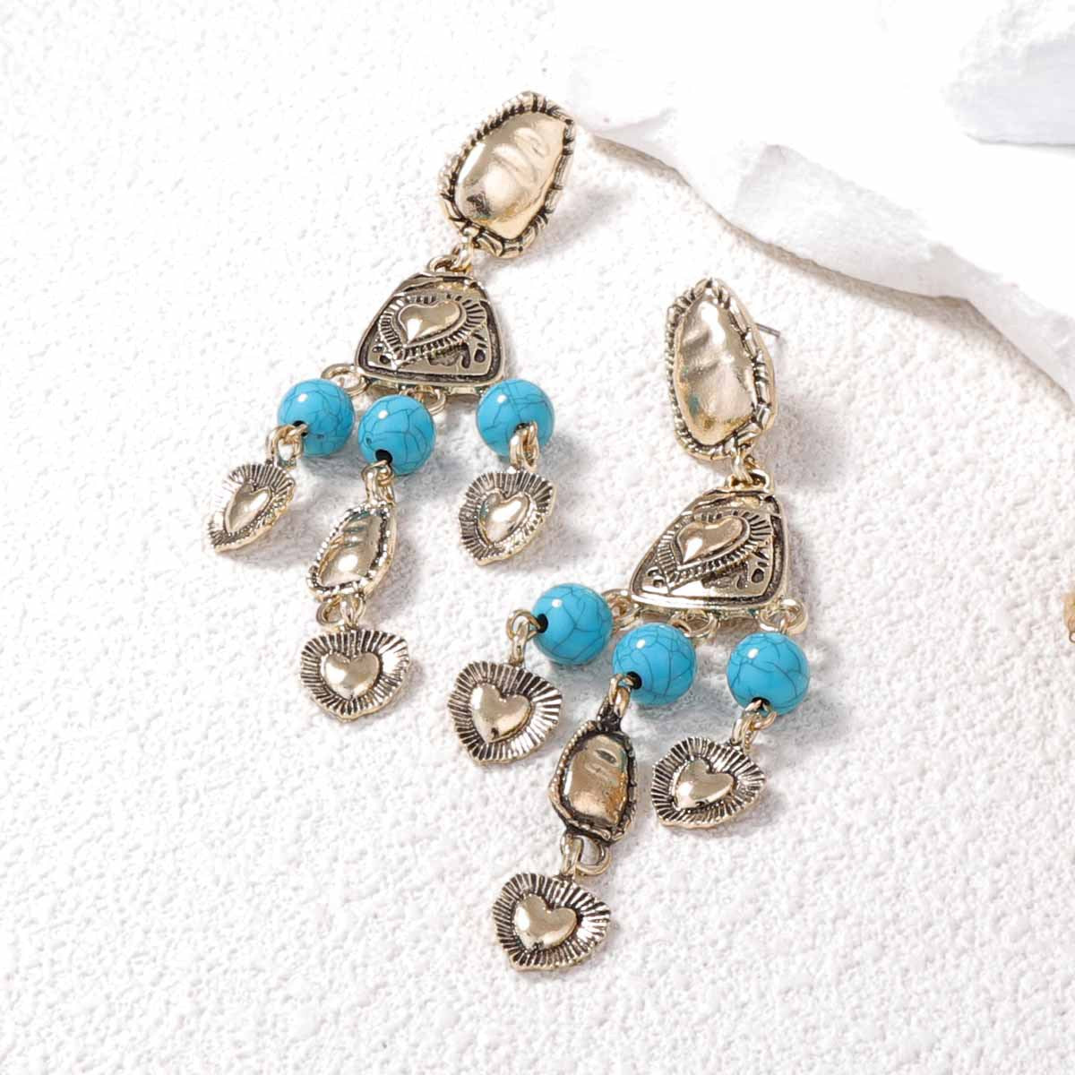Chic Vintage Western-Inspired Irregular 3D Heart Tassel Earrings - Unique Distressed Design for Every Occasion