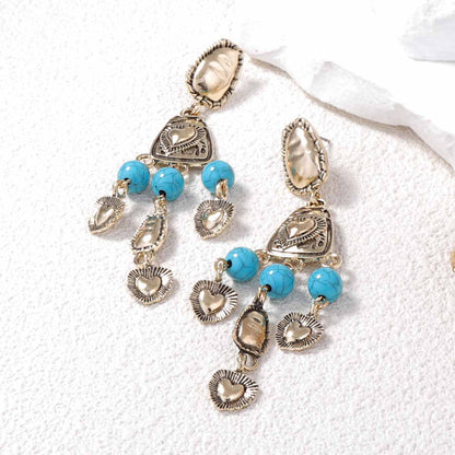Chic Vintage Western-Inspired Irregular 3D Heart Tassel Earrings - Unique Distressed Design for Every Occasion