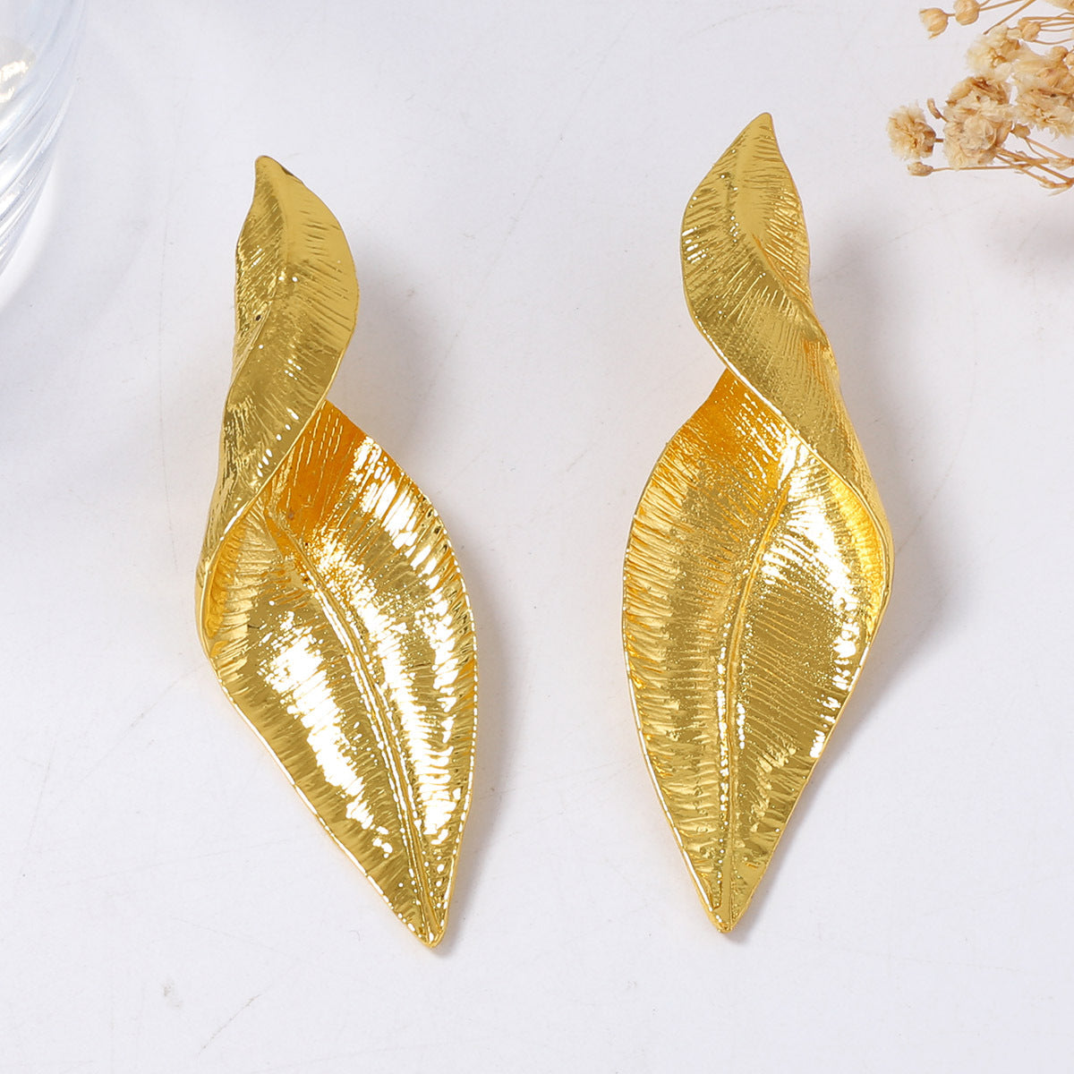 Chic Vintage-Inspired Irregular Leaf Earrings with Twisted Texture - Bold and Elegant Statement Jewelry for Women