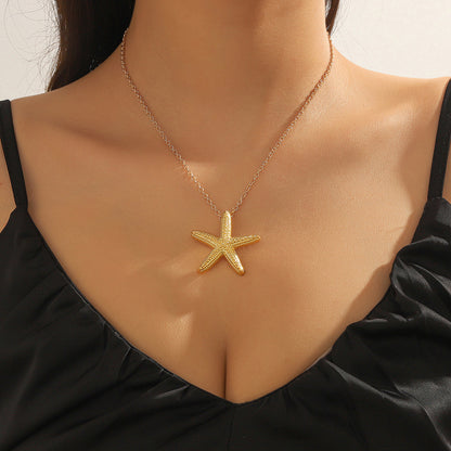 Elegant Gold Star and Pink Fish Necklace - Chic Versatile Jewelry for Every Occasion