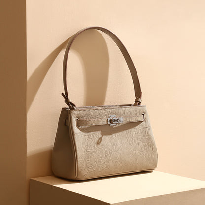 Luxurious Vintage Style Leather Tote Bag with Lock Closure Cowhide for Chic Commuting and Versatile Carrying Options