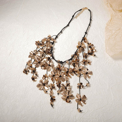 Unique Vintage-Inspired Exaggerated Metal Flower Tassel Pendant Necklace - Handmade Braided Rope Design for a Chic Boho Look
