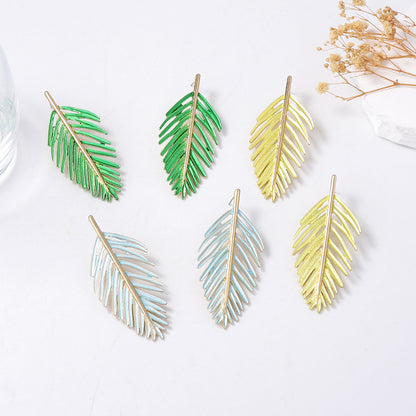 Exaggerated Minimalist Alloy Hollow Leaf Stud Earrings – Chic, Versatile Everyday Jewelry for Effortless Style