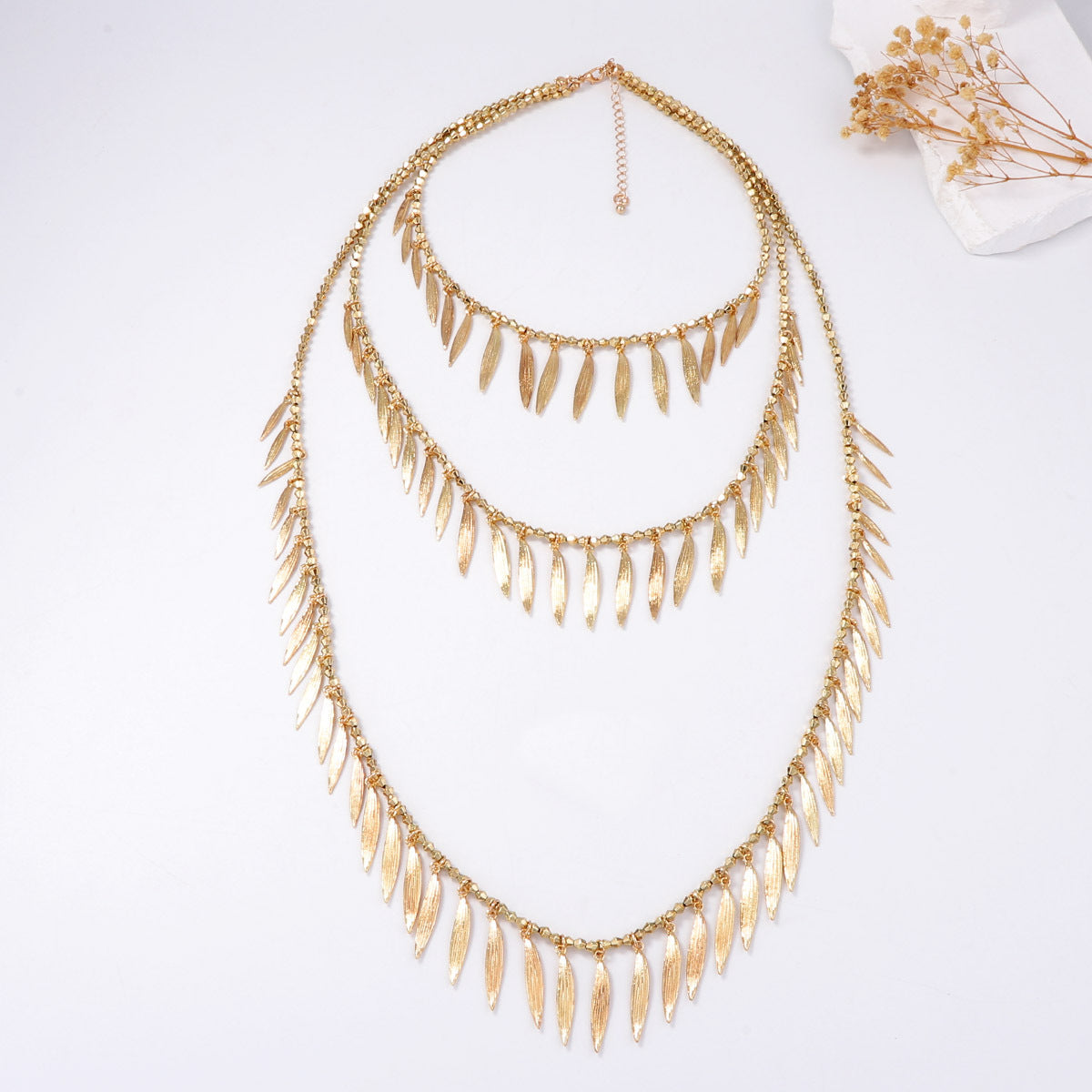 Boho-Chic Beaded Texture Pendant Necklace with Alloy Feather and Leaf Charms - Unique Personality Statement Jewelry for Effortless Style