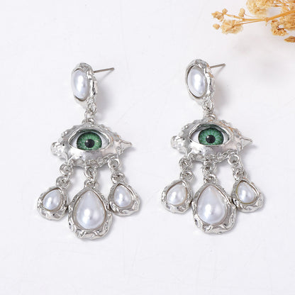 Stunning Vintage Devil's Eye Earrings with Rhinestone and Faux Pearl Accents - Exquisite Court-Style Tassel Design for Elegant Fashion