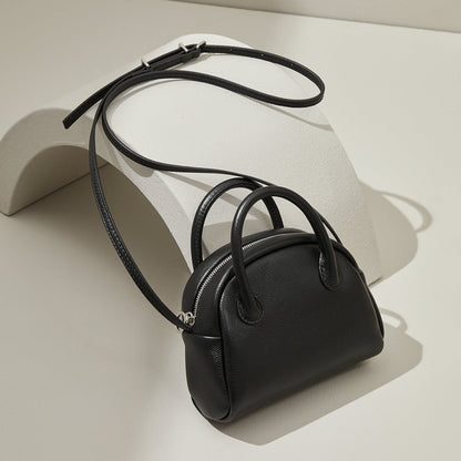 Grain Leather Korean Inspired Bowling Bag Shell Design Versatile Handheld Crossbody Carry Luxurious Genuine Leather Small Purse for Fashion Forward Individuals