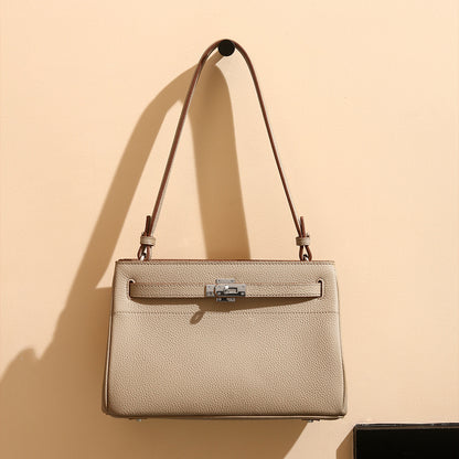 Luxurious Vintage Style Leather Tote Bag with Lock Closure Cowhide for Chic Commuting and Versatile Carrying Options