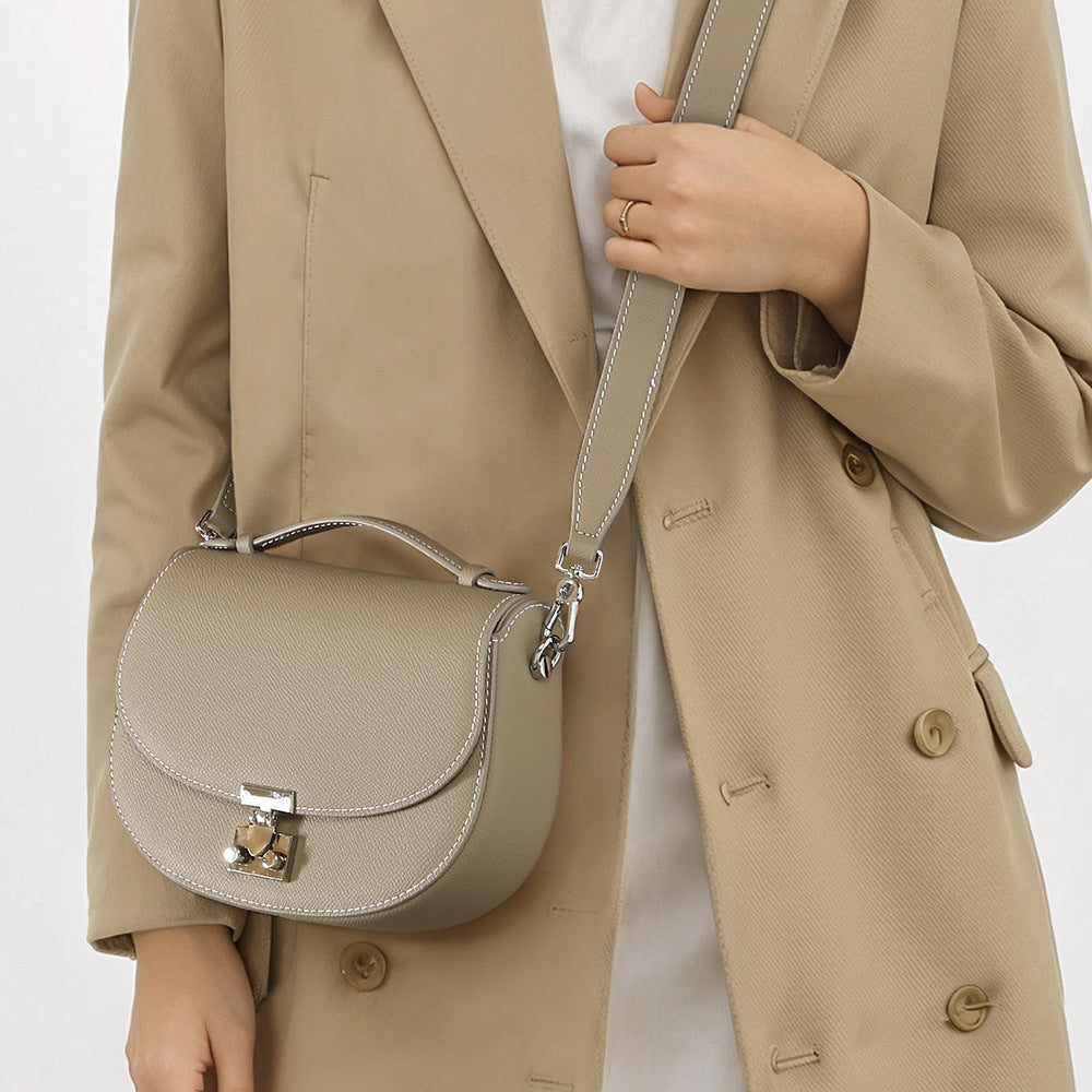 Spring Collection Genuine Leather Women's Handbag Minimalist Cowhide Tote with Unique Design Versatile Crossbody Bag for Commuting and Everyday Use