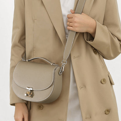 Spring Collection Genuine Leather Women's Handbag Minimalist Cowhide Tote with Unique Design Versatile Crossbody Bag for Commuting and Everyday Use