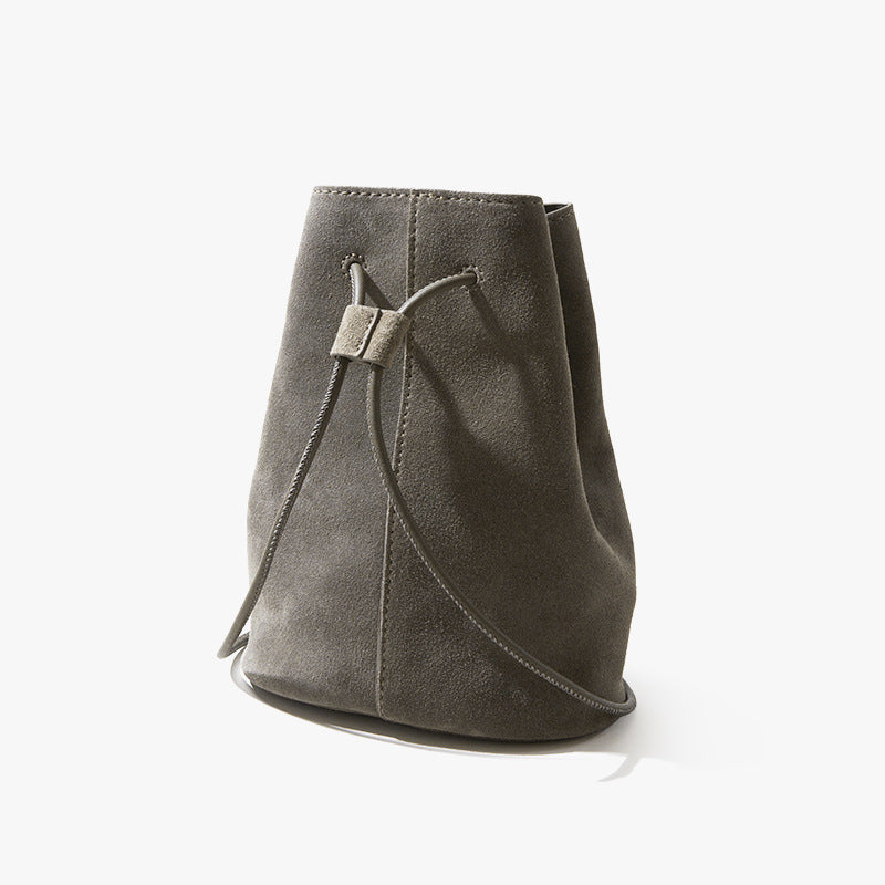 High Gloss Pebbled Cowhide Leather Mini Bucket Bag for Women Chic Vintage Inspired Design for Commute Versatile Shoulder and Handheld Style