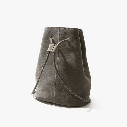High Gloss Pebbled Cowhide Leather Mini Bucket Bag for Women Chic Vintage Inspired Design for Commute Versatile Shoulder and Handheld Style