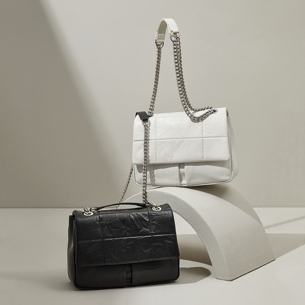 Korean Inspired Chain Handle Crossbody Bag Grain Leather Spacious Design and Unique Style for Everyday Use