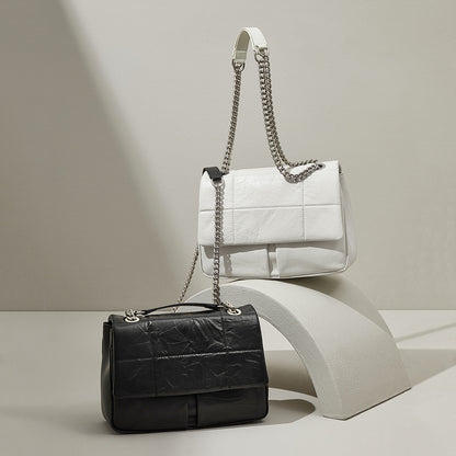Korean Inspired Chain Handle Crossbody Bag Grain Leather Spacious Design and Unique Style for Everyday Use