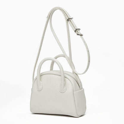 Grain Leather Korean Inspired Bowling Bag Shell Design Versatile Handheld Crossbody Carry Luxurious Genuine Leather Small Purse for Fashion Forward Individuals