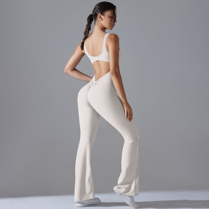 Beautiful Hollow Back Bodysuit for Women Peach Cutting High Waisted Sports Jumpsuit with Flared Pants and Butt Lifting Design for Yoga Gym and Activewear