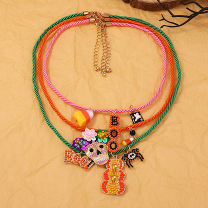 Unique Halloween-Inspired Multi-Layer Alloy Skull and Pumpkin Letter Pendant Necklace – Perfect for Spooky Fashion Enthusiasts