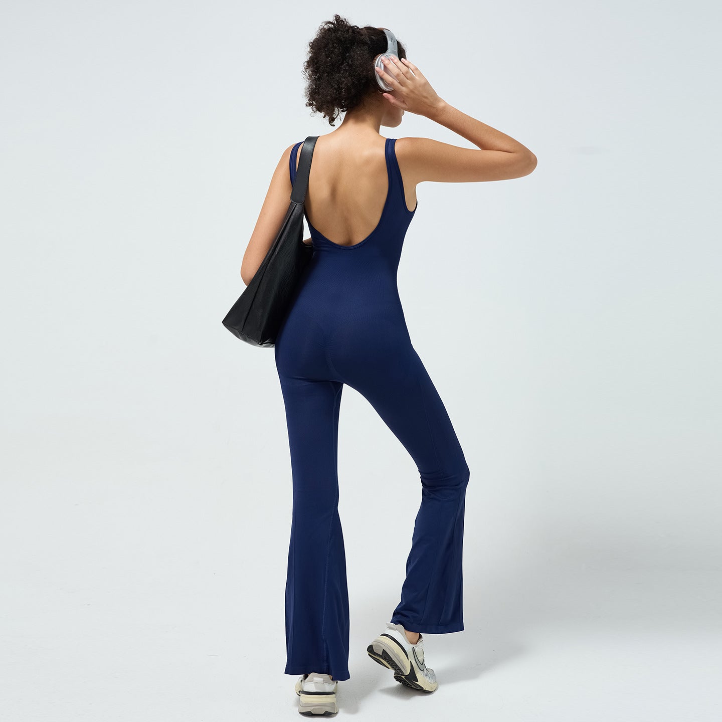 Seamless Backless Jumpsuit with Built in Bra for Fall and Winter Yoga Flowy Wide Leg Design for Active Women