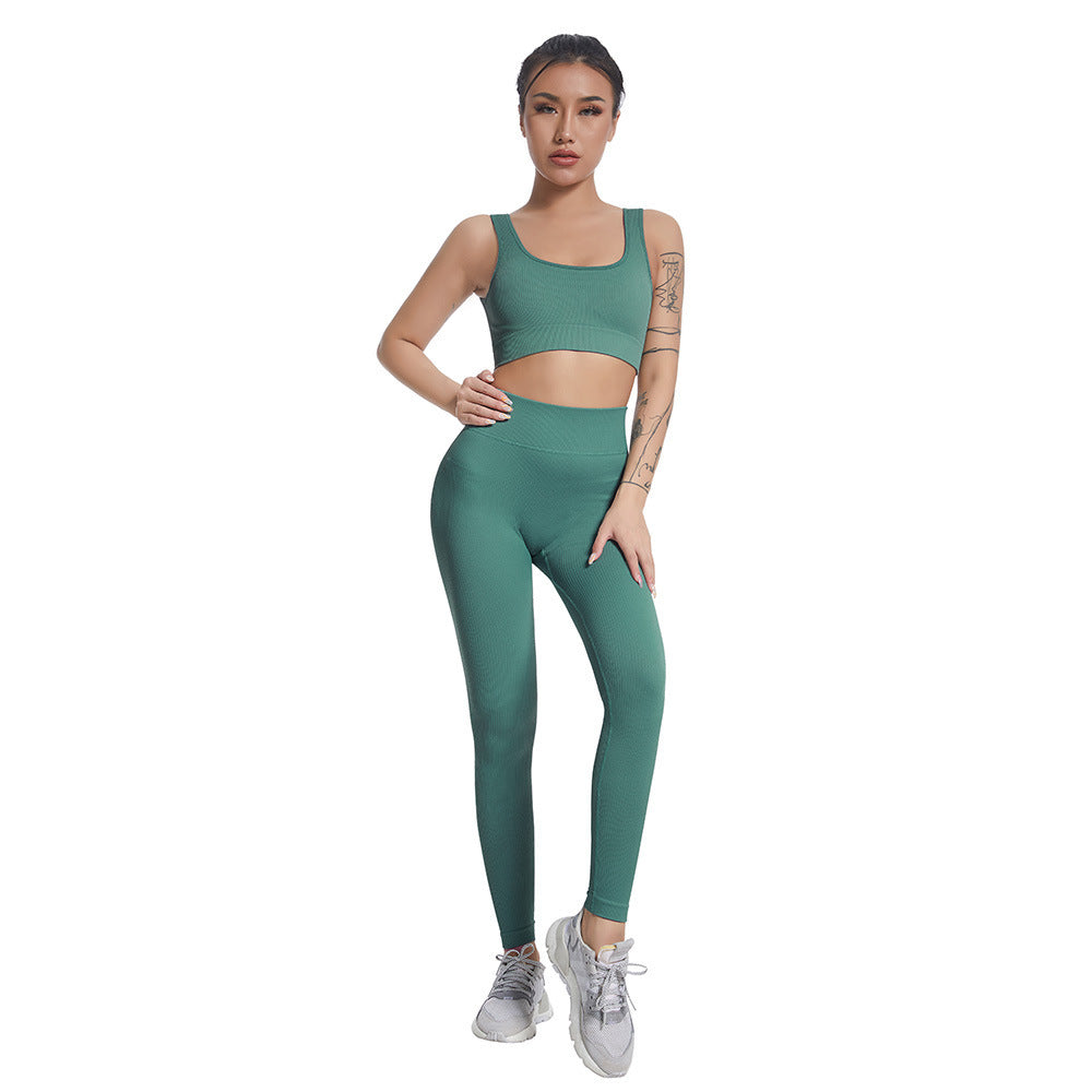 Seamless Vertical Ribbed Yoga Set for Women Moisture Wicking Slim Fit Sports Bra and Leggings for Comfort and Performance