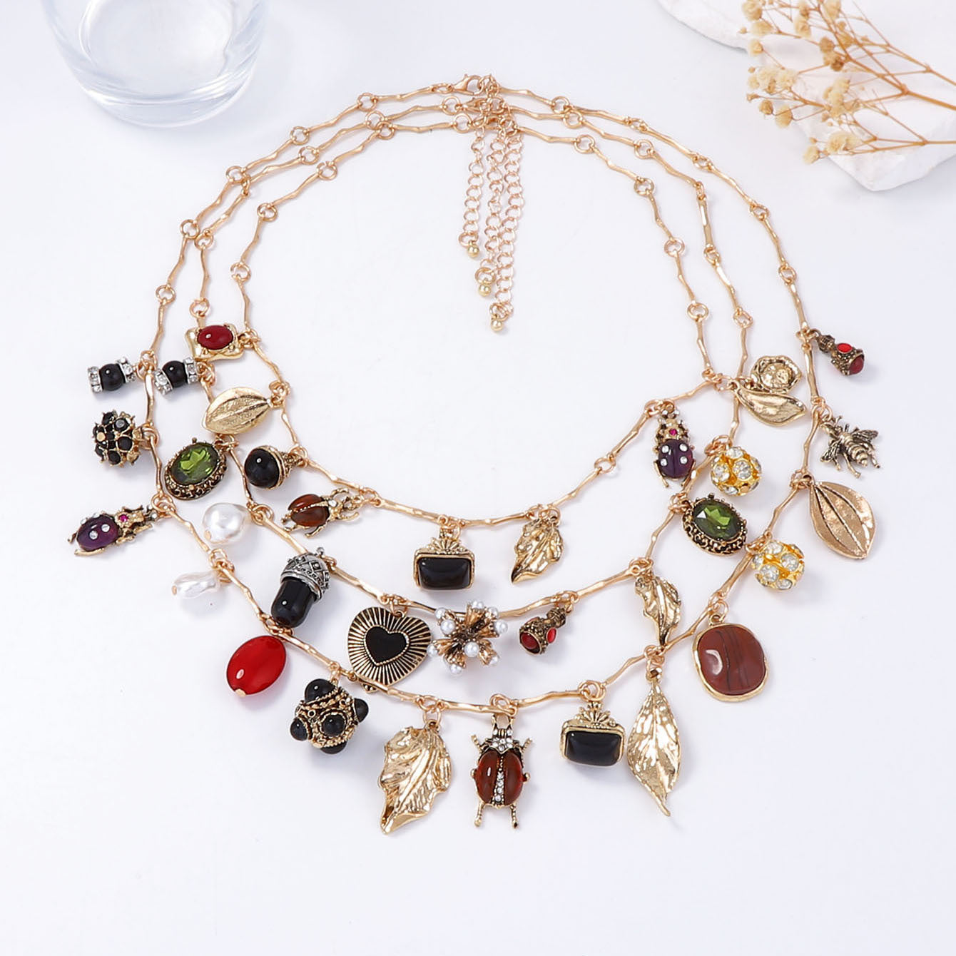 Vintage-Inspired Layered Pendant Necklace Featuring Unique Insect, Leaf, Heart, and Geometric Designs - Perfect for Adding a Touch of Bohemian Charm to Any Outfit