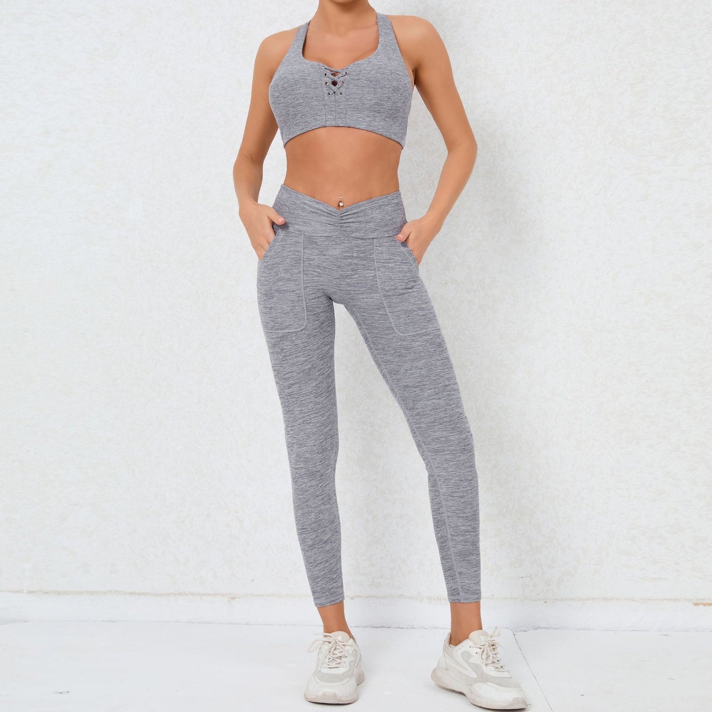 High Performance Sports Bra and Leggings Set for Comfort and Support Features Pocketed Yoga Pants Butt Lifting Design and Ruffled Waistband for Enhanced Workout Experience