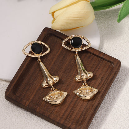 Unique and Bold Personality Statement Earrings with Eye, Nose, and Mouth Design – Trending Devil Eyes Jewelry for a Striking Look