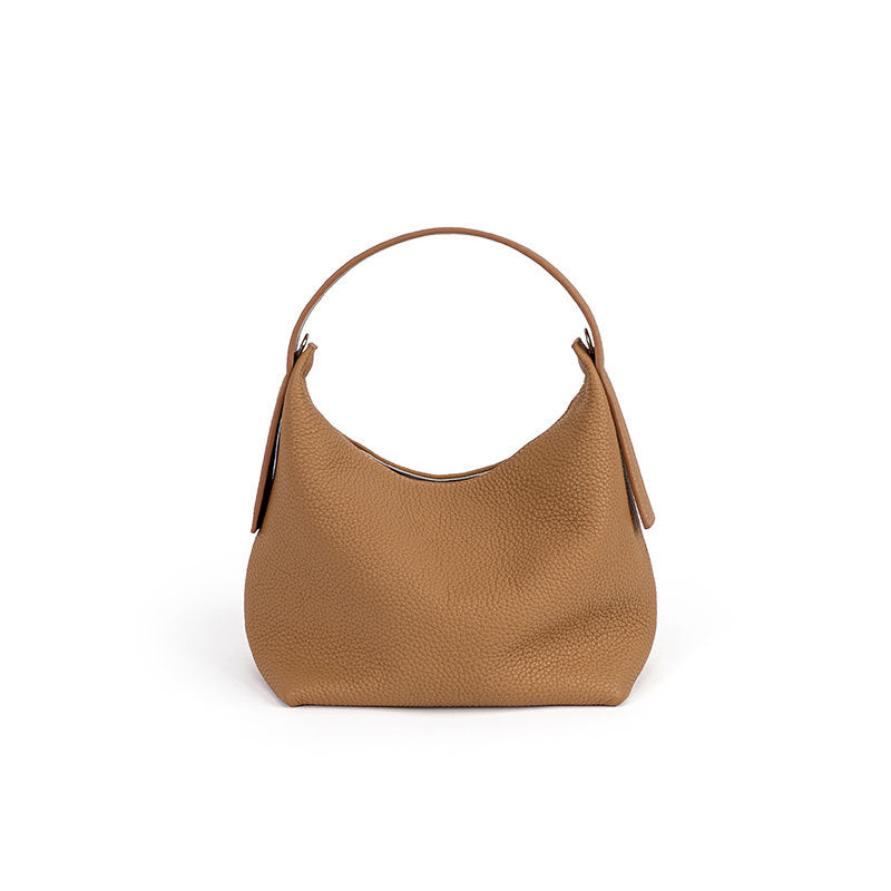 Versatile Bucket Bag Chic Korean Style Crossbody Handbag in Litchi Leather Featuring Magnetic Snap Closure Genuine Leather Tote for Everyday Commuting