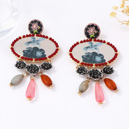 Exaggerated Ethnic Artistry: Chic Composite Gold Resin Bird and Floral Tassel Drop Earrings – Lightweight, Unique Design for Every Occasion
