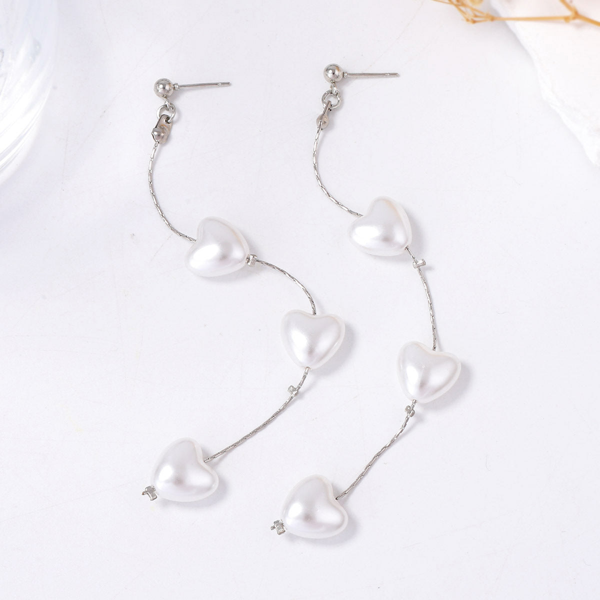 Elegant French-Style Long Pearl Heart Drop Earrings for Women - Chic and Unique Statement Piece Perfect for Parties and Special Occasions