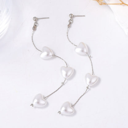 Elegant French-Style Long Pearl Heart Drop Earrings for Women - Chic and Unique Statement Piece Perfect for Parties and Special Occasions
