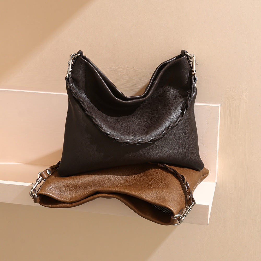 Grain Leather Minimalist Tote Bag Spacious Luxury Handbag for Women with Unique Woven Shoulder Strap for Commuting and Everyday Use