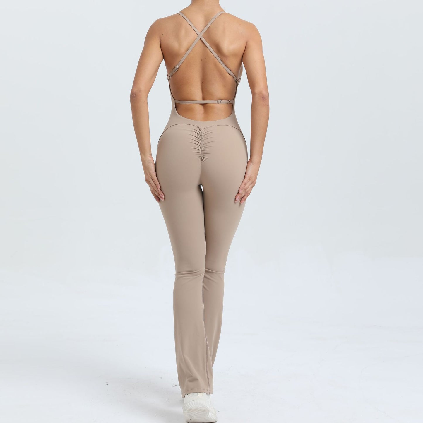 Adjustable Strap Beautiful Back Bodysuit for Peach Butt Yoga Jumpsuit and Fitness Wear with Flared Legs for Comfort and Flexibility