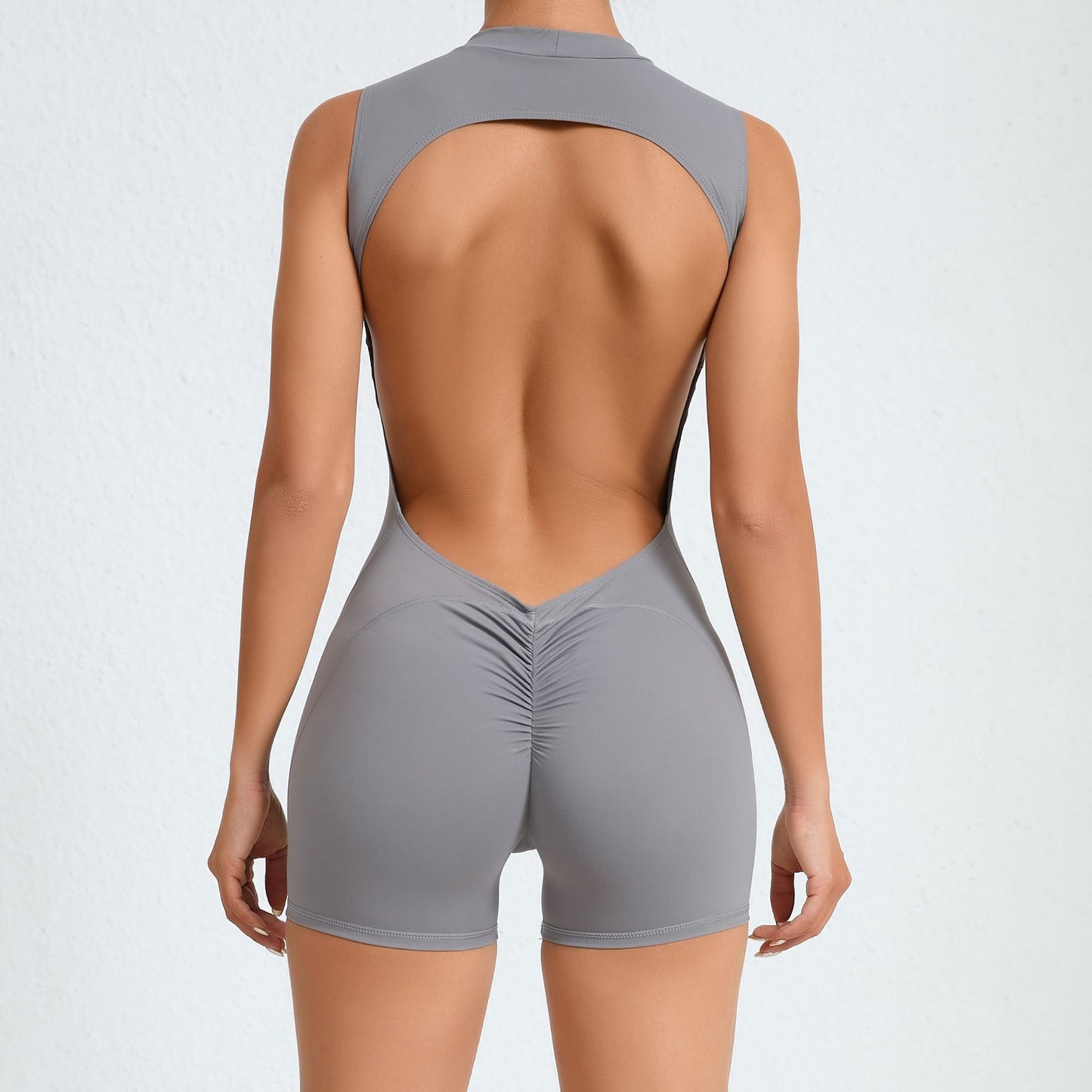 Sleeveless Hollow Back Yoga Bodysuit with Removable Chest Pads for Fitness Sculpting Your Peach Bottom and Enhancing Comfort During Workouts