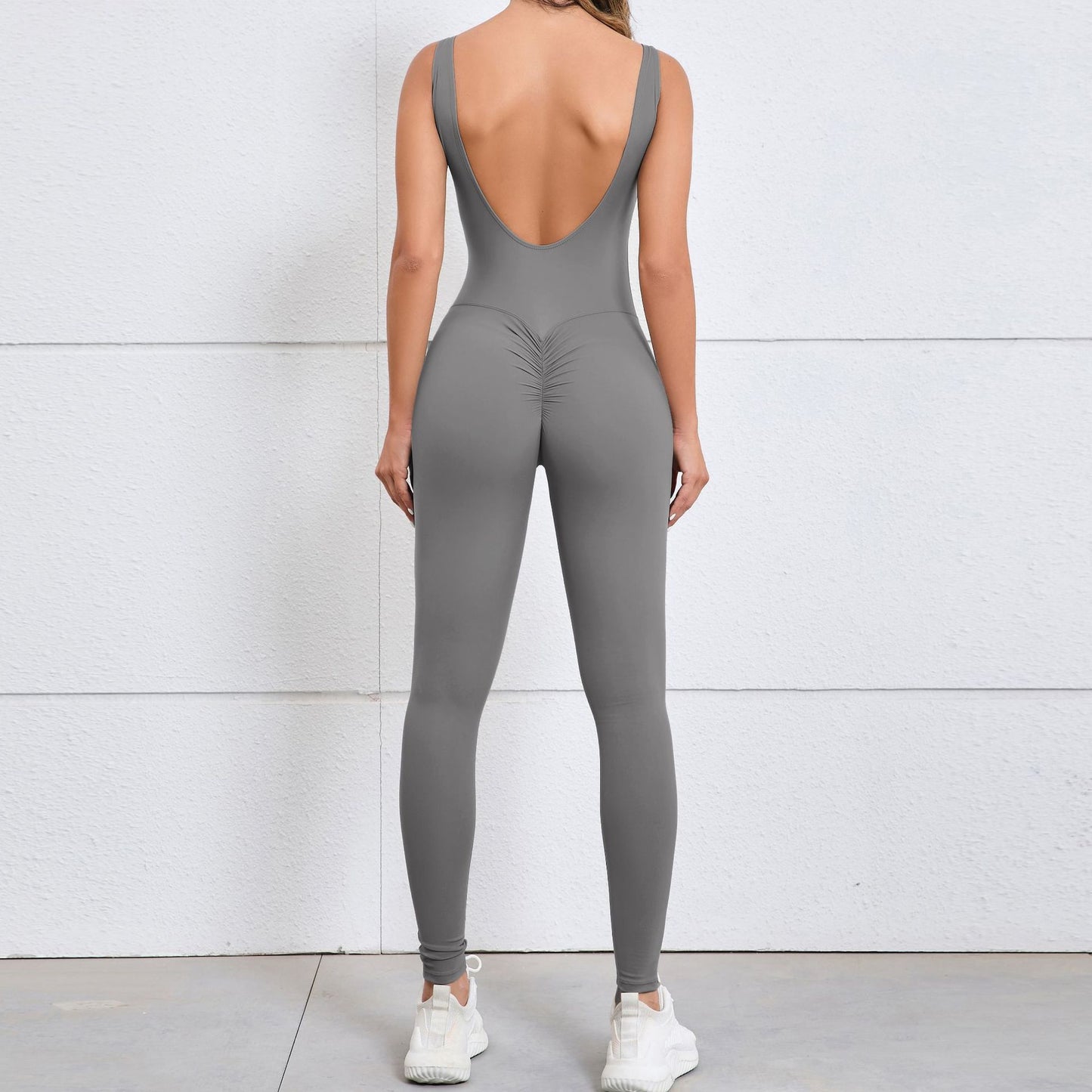 Hollow Back Peach Butt Lifting Bodysuit for Women Quick Dry Form Fitting Yoga and Fitness Jumpsuit 7448