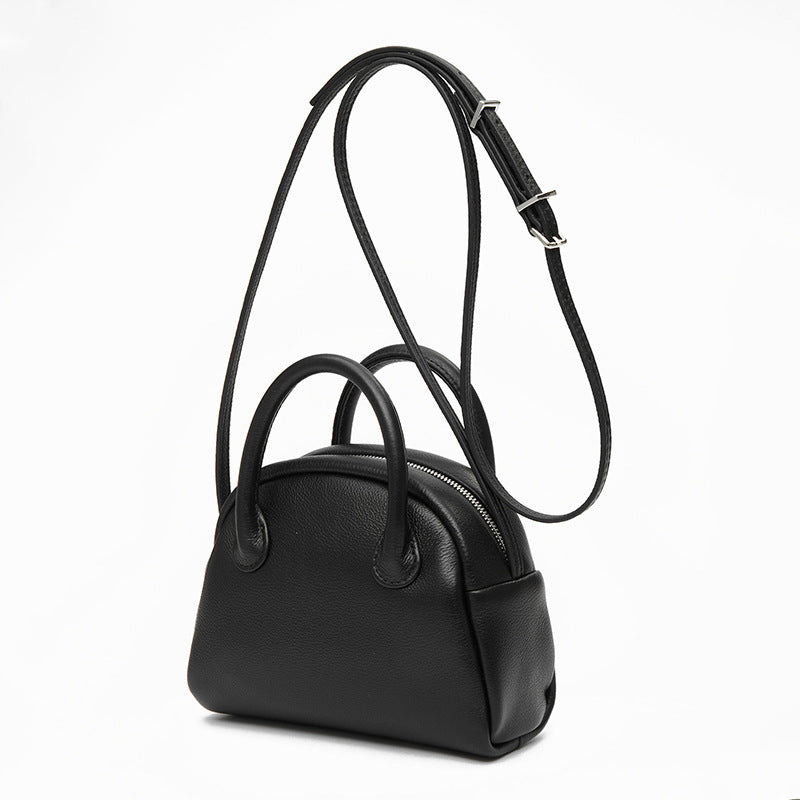 Grain Leather Korean Inspired Bowling Bag Shell Design Versatile Handheld Crossbody Carry Luxurious Genuine Leather Small Purse for Fashion Forward Individuals