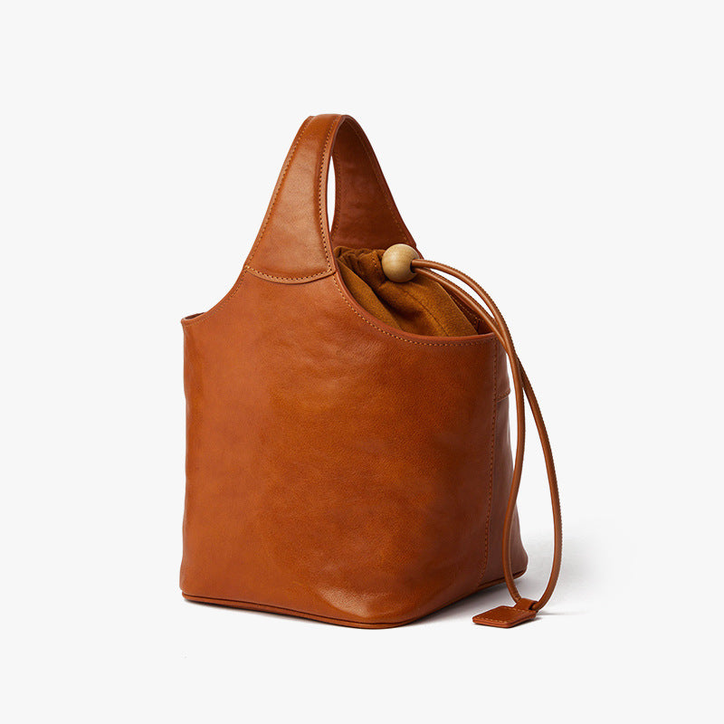 Vintage Crystal Tanned Cowhide Flower Basket Bag Luxury Feel Unique Design for Commuting and Everyday Use