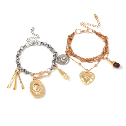 Chic Vintage-Inspired High-End Layered Chain Bracelet with Heart and Geometric Pendant - Perfect for Stacking and Everyday Elegance