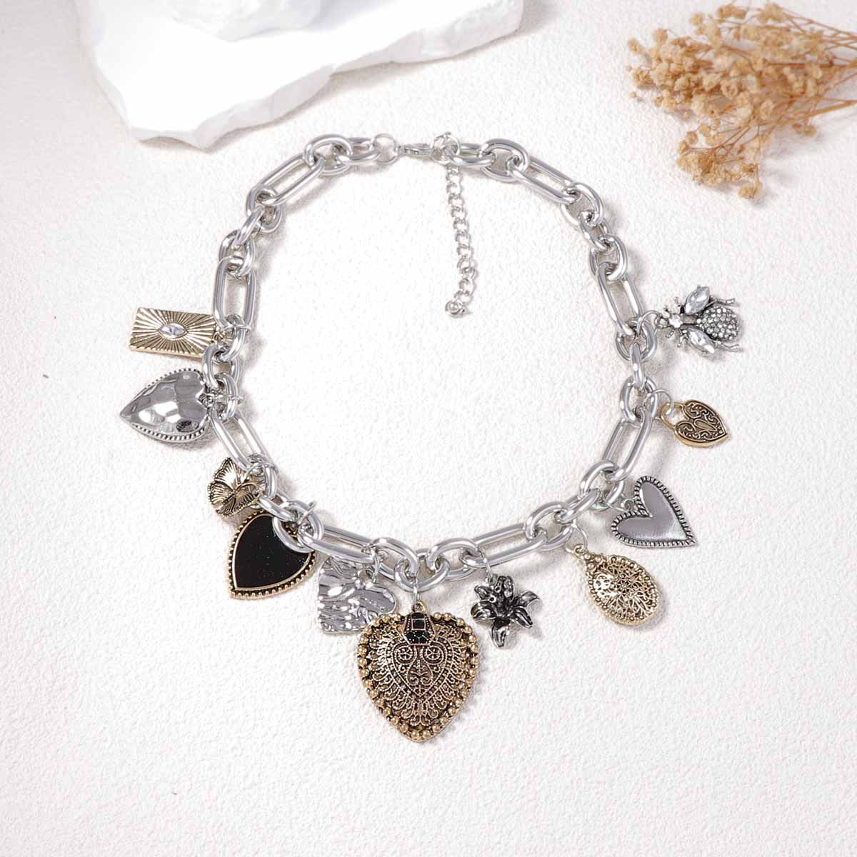 Vintage-Inspired Creative Alloy Heart Pendant Necklace with Micro-Paved Zircon Stones - Stylish Chain Options for a Unique Look