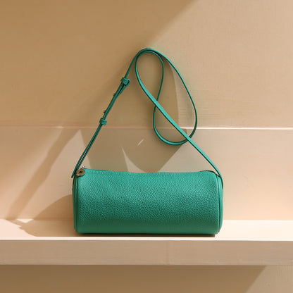 Chic Minimalist Leather Pencil Case Purse for Women Commute Friendly Cylindrical Bag with Spacious Capacity and Crossbody Design